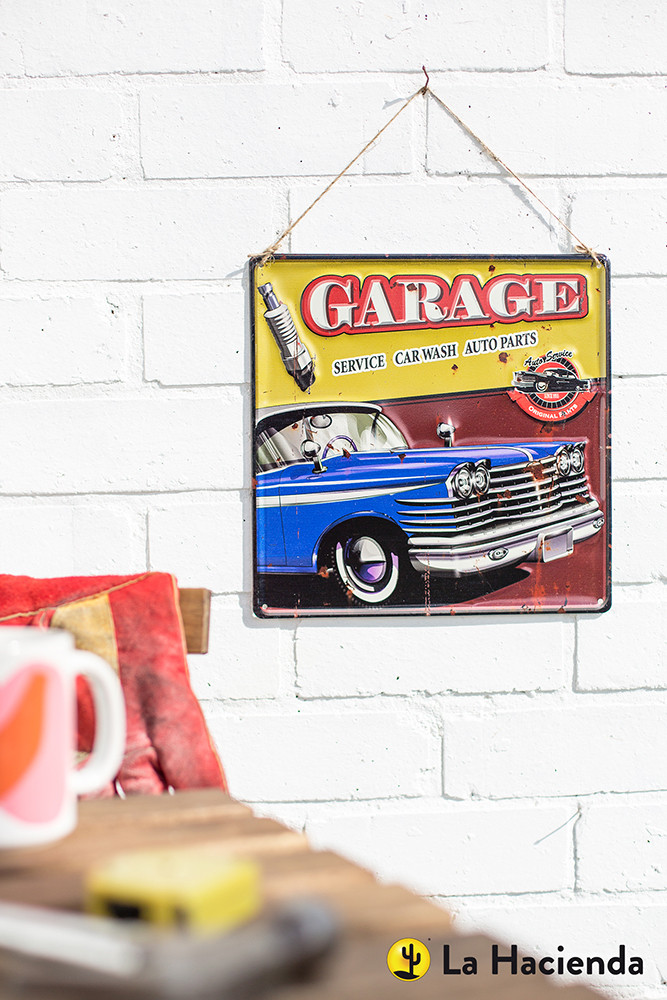 An image of Embossed Metal Sign - Garage